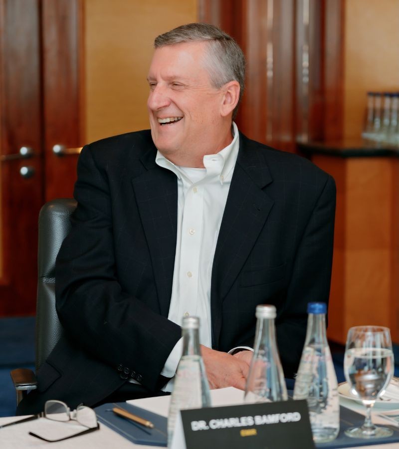 Dr. Chuck Bamford in a strategy consulting discussion