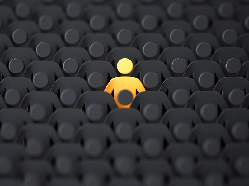 Person highlighted among a crowd representing the perfect customer